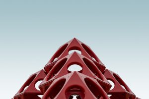 Low angle red geometrical structure blue sky