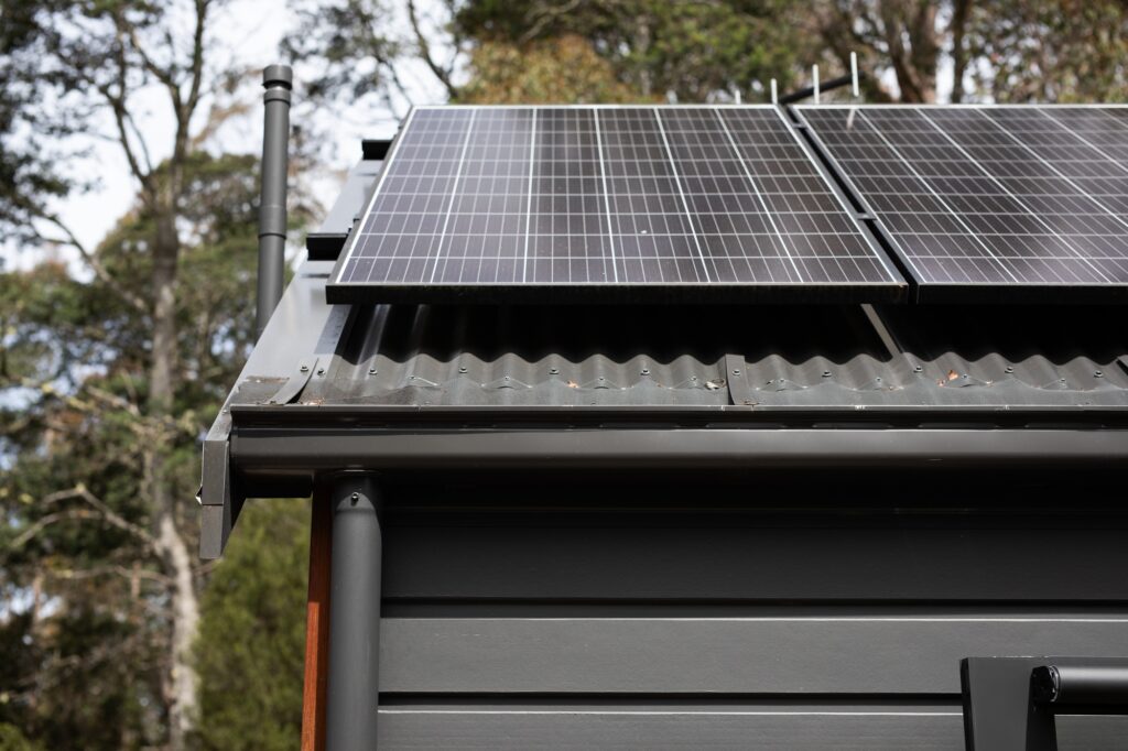 solar panels cabin roof colorbond wilderness tiny house